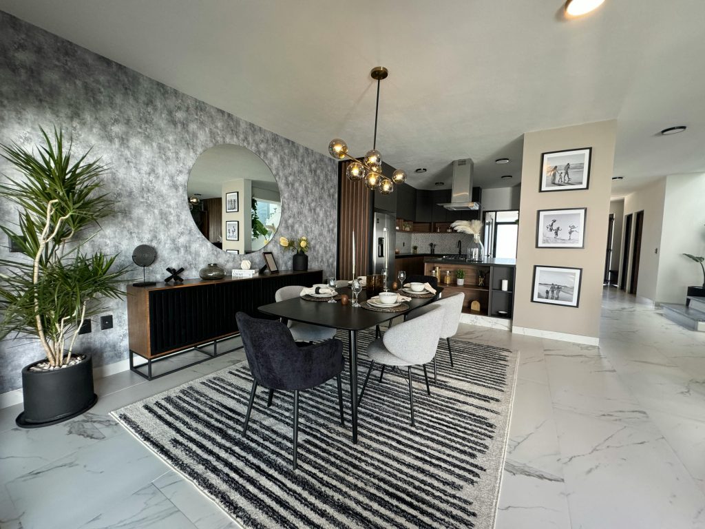 Stylish modern dining room featuring elegant decor and natural lighting for a luxurious ambiance.